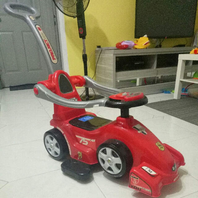 kids pushing car