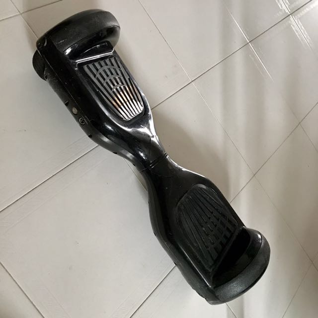 Hover board (Category: Other PMDs & Parts) located in Singapore. Submitted by lyh (Listing ID 126517129, Image 2). Description: Hoverboard Color black Some scratches Including adapter for charging Still working. Bought it first hand at $500+.