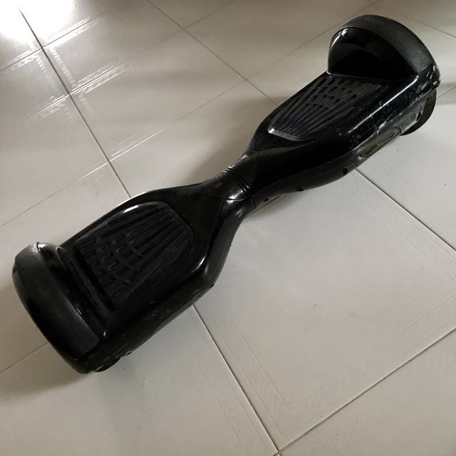 Hover board (Category: Other PMDs & Parts) located in Singapore. Submitted by lyh (Listing ID 126517129, Image 3). Description: Hoverboard Color black Some scratches Including adapter for charging Still working. Bought it first hand at $500+.