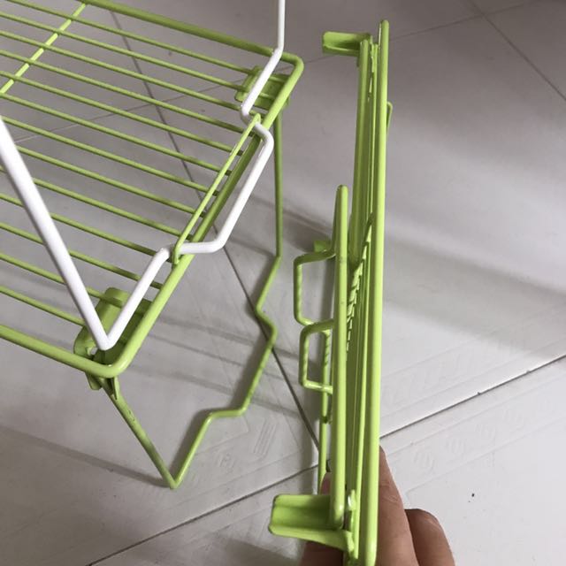 Stackable foldable kitchen accessories (Category: Other Kitchen Appliances) located in Singapore. Submitted by lyh (Listing ID 126512999, Image 3). Description: When stack it can be lock. (Picture 3) When not in use, it can be fold for easy keeping. (Picture 4) 1.50 each Useful for kitchen and toilet I left with 2 green and 1 white (Take all 3 at $4) .