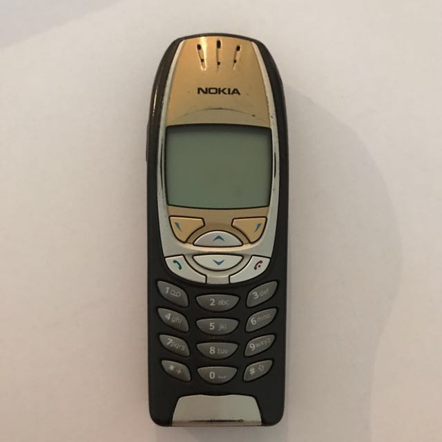 Old-school Nokia phone - gold and silver. Collector's item ...