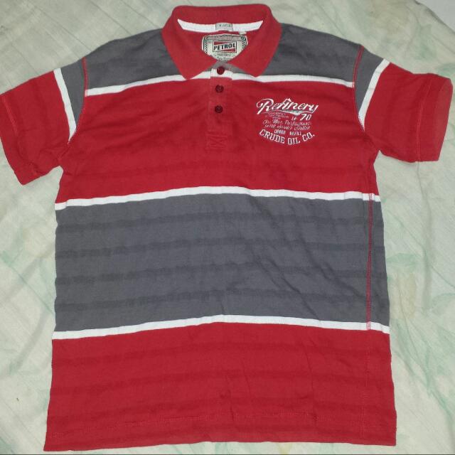 Petrol Muscle Fit Shirt (Category: Tshirts & Polo Shirts ) located in Pasig City. Submitted by declutter_a_ciro (Listing ID 126760913, Image 1). Description: Slightly used. Red and gray. Muscle fit. Slim fit. Good condition. Cotton and presko isuot..