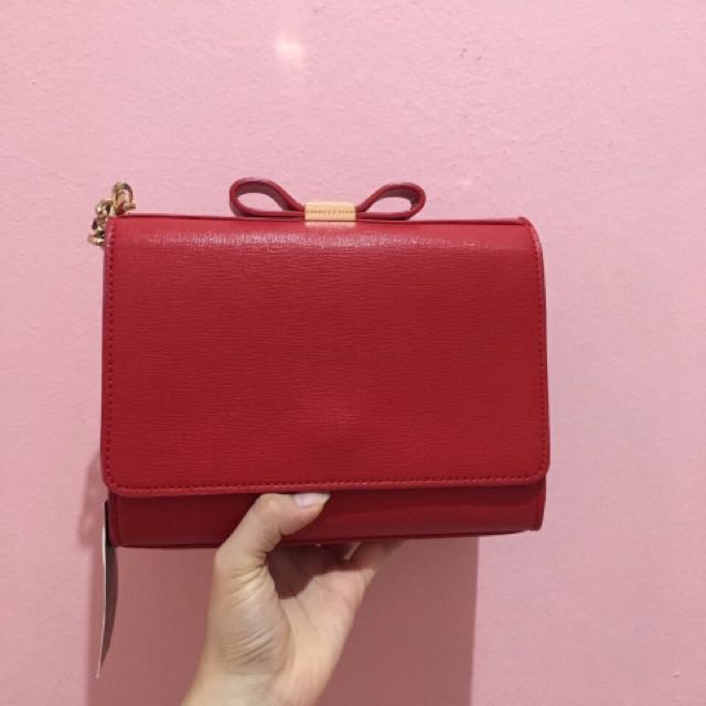 charles and keith bow detail clutch