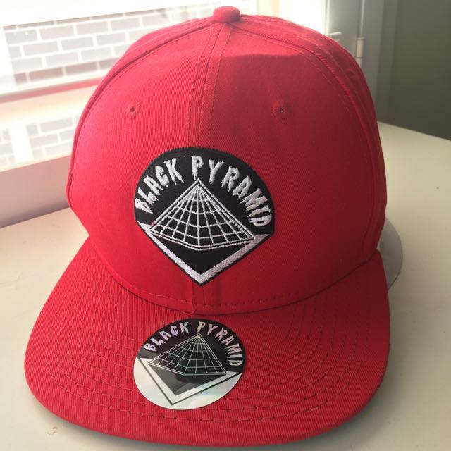 Red Black Pyramid Snapback Hat Chris Brown Men S Fashion On Carousell