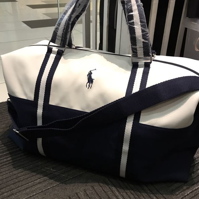 RALPH LAUREN WHITE (PVC) & BLUE DUFFLE BAG WITH SLING, Luxury, Bags &  Wallets on Carousell