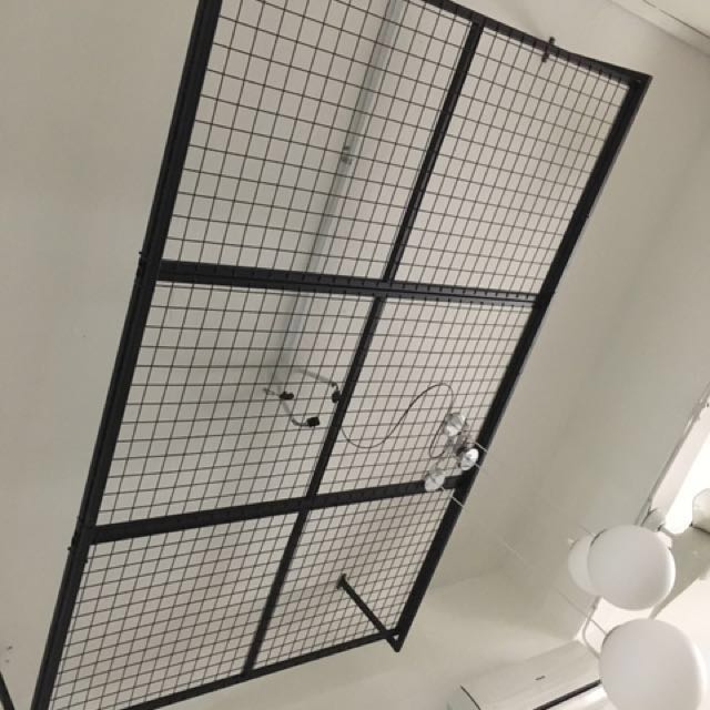 Almost new Ceiling hanging metal rack for display of lights and fans