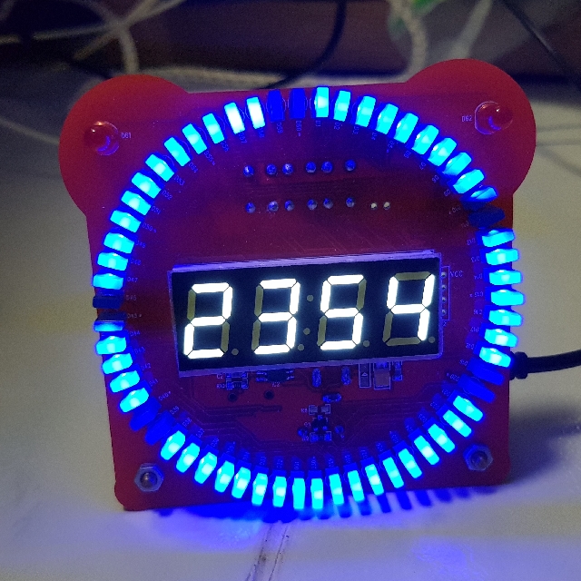 Digital clock (Category: Clocks) located in Singapore. Submitted by guo.zhiming (Listing ID 128072270, Image 2). Description: 24 hrs format battry backup 60 blue leds for mins 10 mode of mins alarm clock, 2 red led lights up.