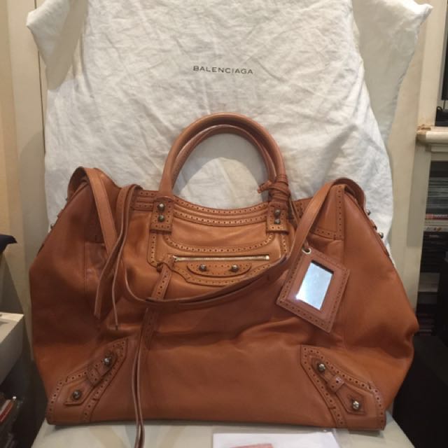 💯Authentic Balenciaga Riva Velo, Tan, Lambskin (Category: Luxury Bags & Wallets) located in Paranaque City. Submitted by lovebrand (Listing ID 100776246, Image 1). Description: Authentic with inclusions and dustbag, paper bag Own this lovely soft lamb skin leather Balenciaga!!.