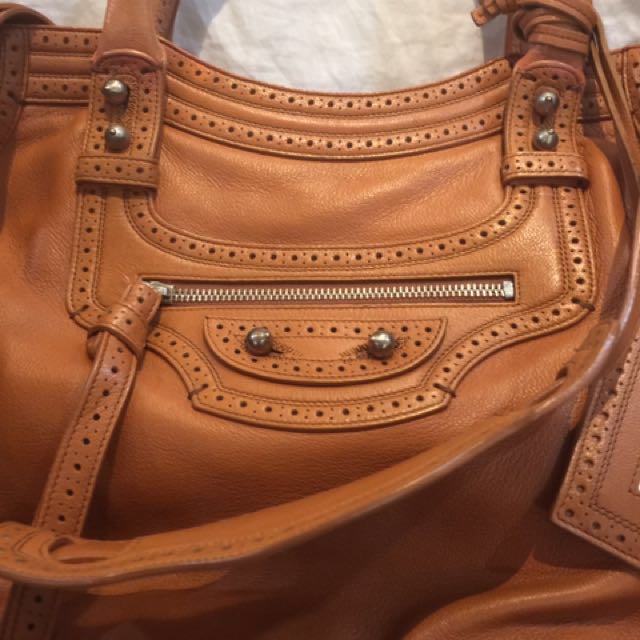 💯Authentic Balenciaga Riva Velo, Tan, Lambskin (Category: Luxury Bags & Wallets) located in Paranaque City. Submitted by lovebrand (Listing ID 100776246, Image 2). Description: Authentic with inclusions and dustbag, paper bag Own this lovely soft lamb skin leather Balenciaga!!.
