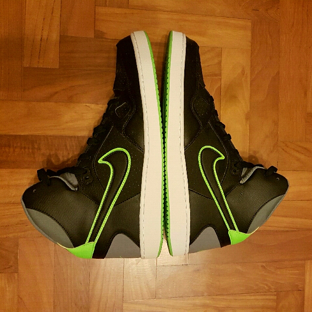 green and black nike high tops