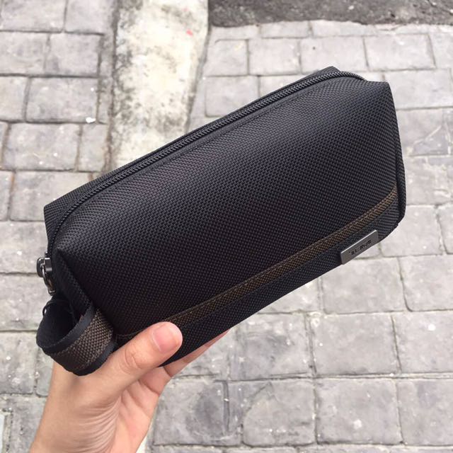 Pouch tumi original outlet