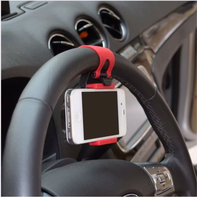 Car steering wheel cellphone holder (Category: Android Others) located in Mandaluyong City. Submitted by atchcatchph (Listing ID 130072607, Image 2). Description: ✔Cellphone holder attached to the steering wheel ✔Compatible to any mobile phones.