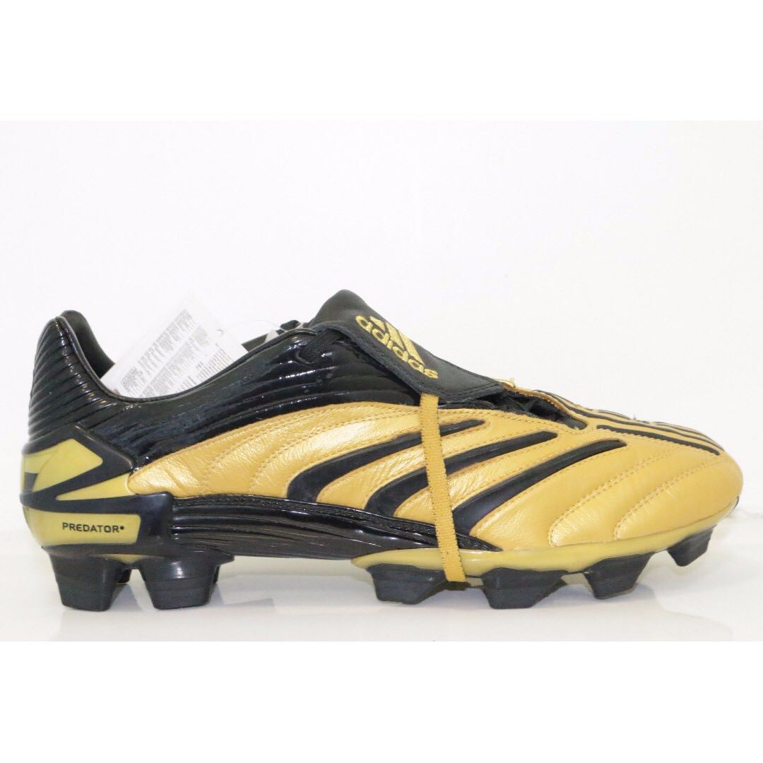 black and gold predator boots