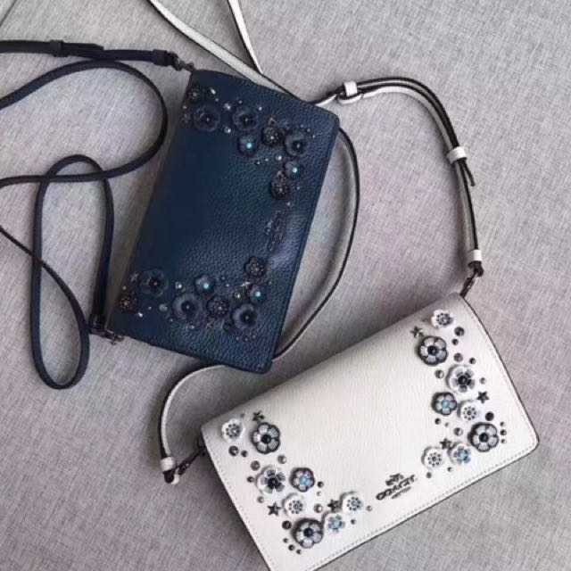 Foldover crossbody clutch in polished pebble leather deals