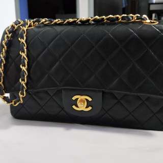 Vintage Chanel medium flap lambskin black bag classic