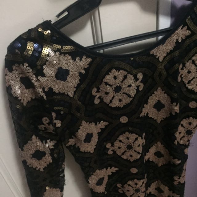 Sequined dress (Category: Dresses) located in Quezon City. Submitted by mvaps (Listing ID 131390718, Image 2). Description: Never worn S-M Very nice in actual.