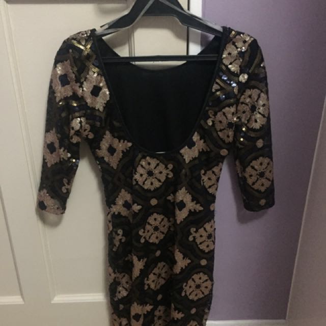 Sequined dress (Category: Dresses) located in Quezon City. Submitted by mvaps (Listing ID 131390718, Image 3). Description: Never worn S-M Very nice in actual.
