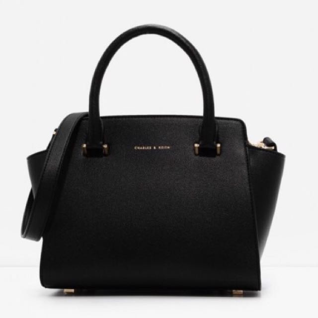 top handle trapeze bag