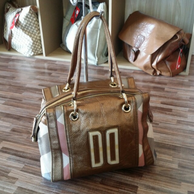 daks leather bolsa