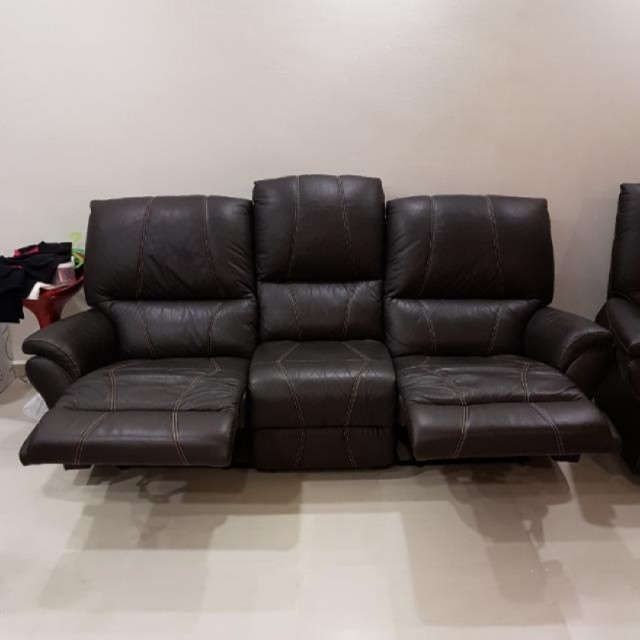 Black Leather Sofa With Leg Rest