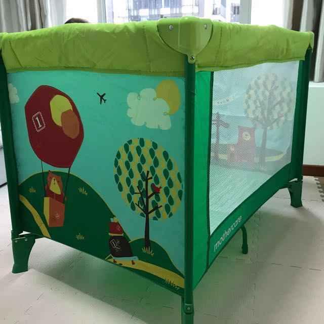 Mothercare jungle travel cot top