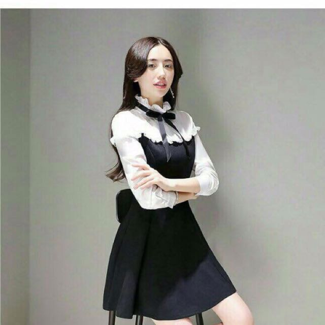 white dress with black ribbon