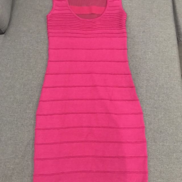 Hot pink bandage dress (Category: Dresses) located in Pasig City. Submitted by cescascloset (Listing ID 134444072, Image 1). Description: Brand new hot pink bandage dress with mesh back detail Bought from SOFA Retail Lab for Php 1,500 Fits size small.