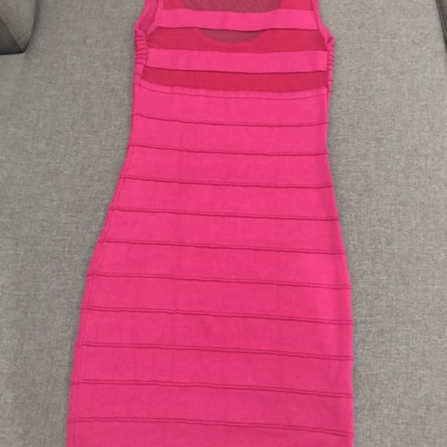 Hot pink bandage dress (Category: Dresses) located in Pasig City. Submitted by cescascloset (Listing ID 134444072, Image 2). Description: Brand new hot pink bandage dress with mesh back detail Bought from SOFA Retail Lab for Php 1,500 Fits size small.