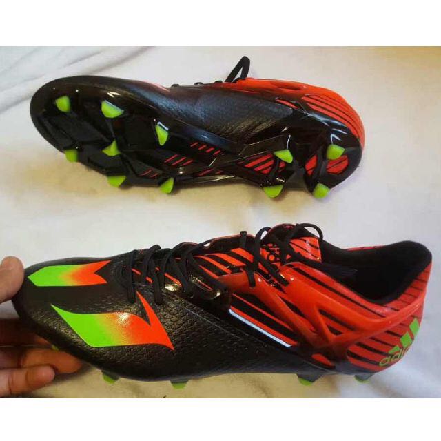 green messi football boots