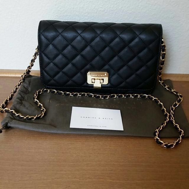 black supreme purse