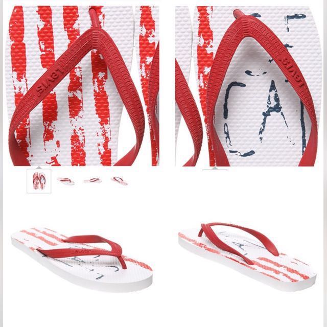 red stripe flip flops