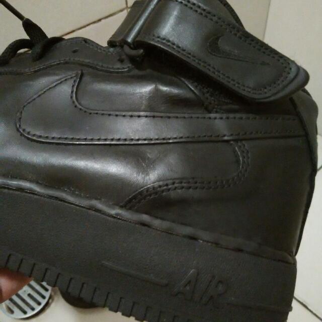 nike black leather high tops