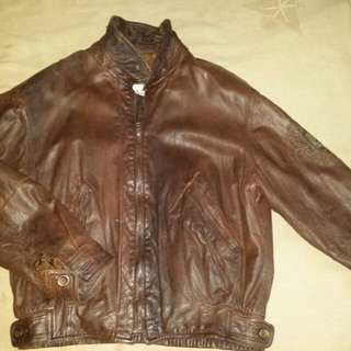 Genuine vintage brown leather jacket.