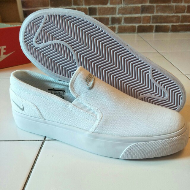 nike toki low womens