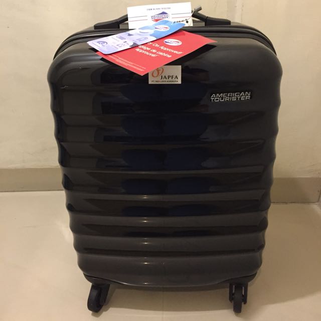 american tourister paralite spinner