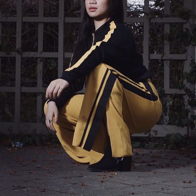 Yellow pants hotsell black stripe