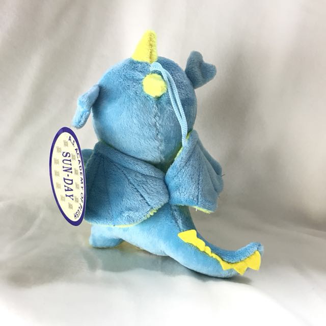 stuffed blue dragon