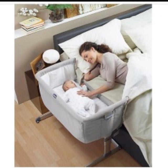 setting up chicco next to me