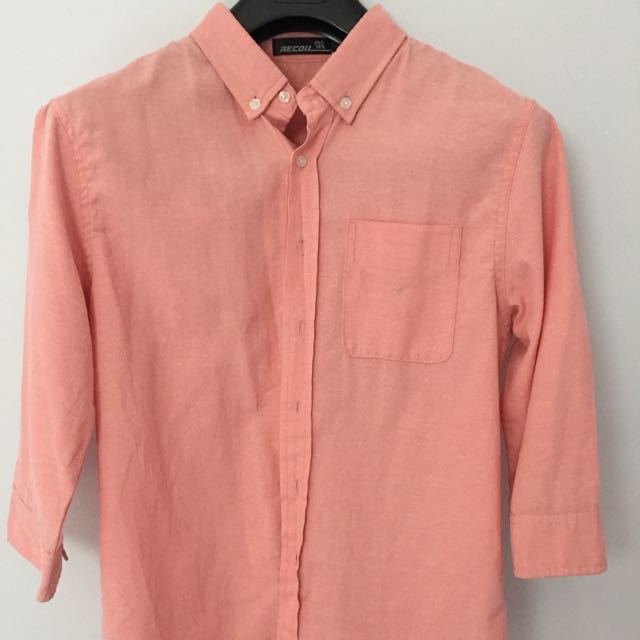 salmon color shirt