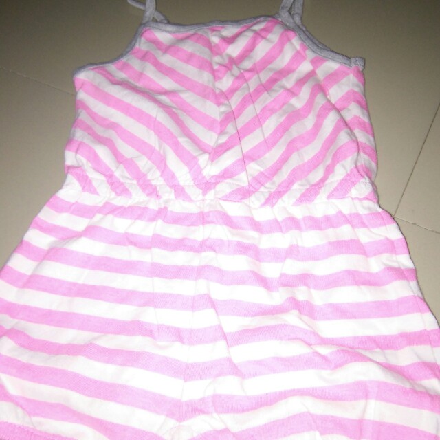 Baby romper (Category: Babies & Kids Fashion) located in Quezon City. Submitted by perpetually (Listing ID 138594325, Image 2). Description: Preloved romper.in good used condition.no flaws.neon pink brand is carter while the floral one is brand less..cute in actual.not ukay ukay..