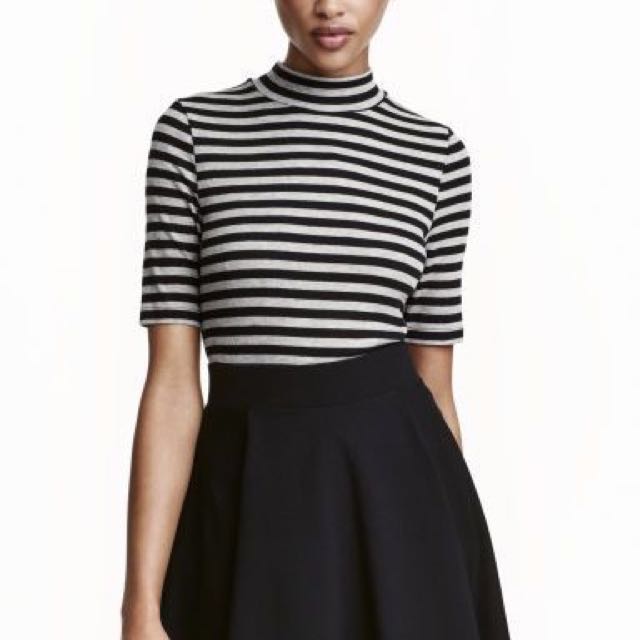 black and white striped mock neck top