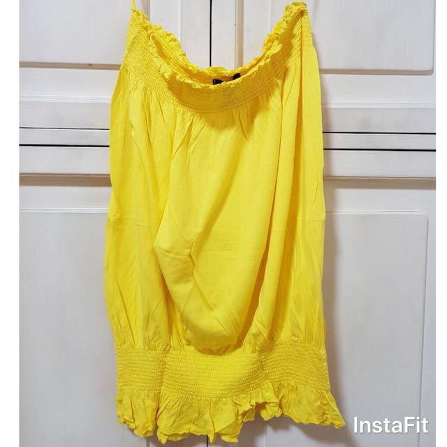 ZARA - Yellow Tube Top (Category: Others Tops) located in Manila. Submitted by classactladybug (Listing ID 138720583, Image 1). Description: Pre-loved. In good condition. Size: Small (but can also fit Medium).