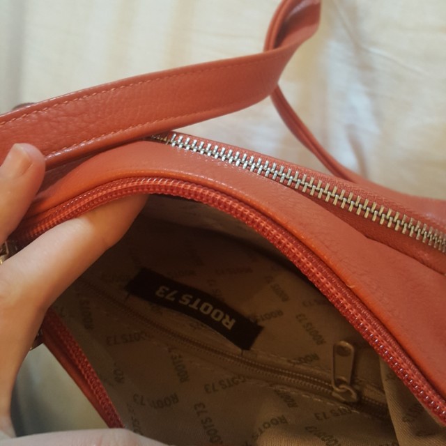 roots 73 purse