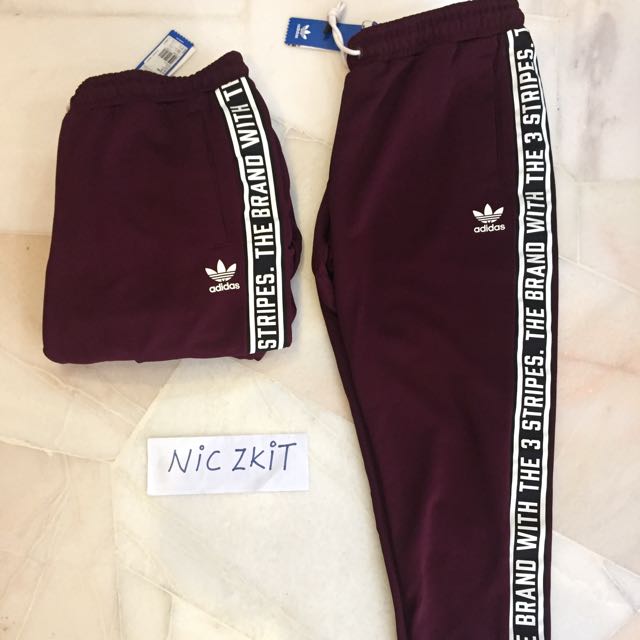 'The Brand with 3 Stripes' Trackpants, Men's Fashion, Bottoms, Joggers on Carousell
