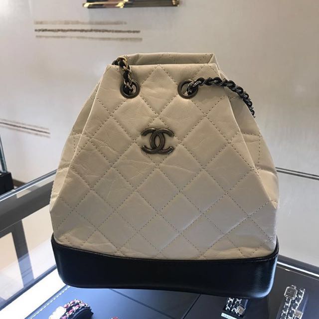 Chanel Gabrielle Backpack in White/Black, Luxury, Bags & Wallets on  Carousell