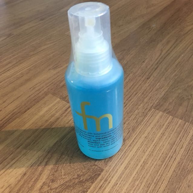 purifying toner by face of man