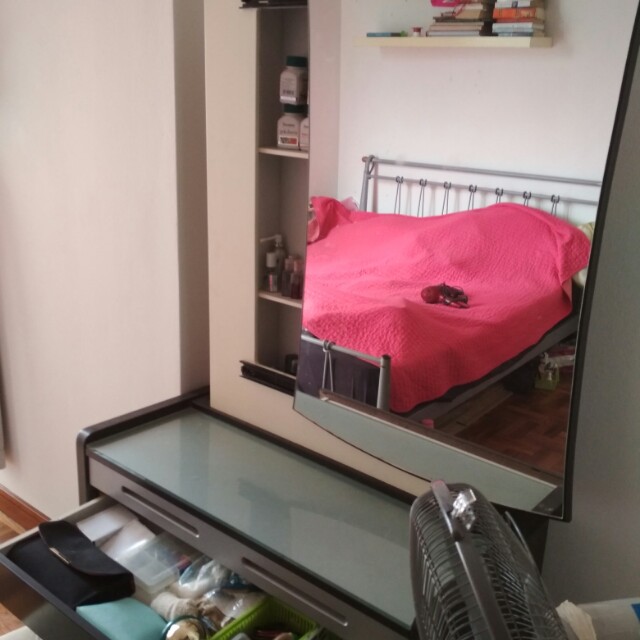 Dressing table (Category: Tables & Sets) located in Singapore. Submitted by nehalsoni (Listing ID 141134539, Image 2). Description: Dressing table with a drawer and sliding drawer. not for fussy buyer. it can hold lot of small things in a sliding drawer. the chair to sit has some stain marks. can send picture seperately if you want. selling it because trying to make space for my little one's. changing table..