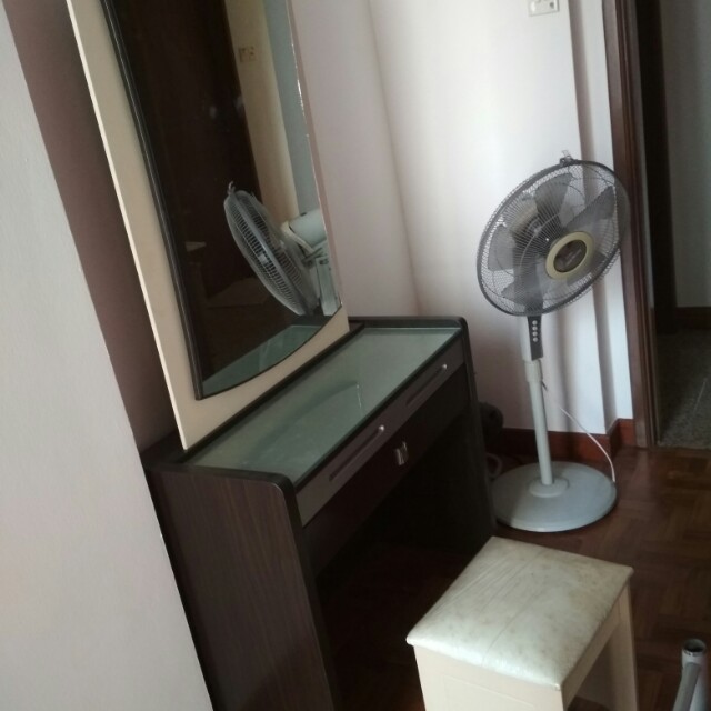 Dressing table (Category: Tables & Sets) located in Singapore. Submitted by nehalsoni (Listing ID 141134539, Image 3). Description: Dressing table with a drawer and sliding drawer. not for fussy buyer. it can hold lot of small things in a sliding drawer. the chair to sit has some stain marks. can send picture seperately if you want. selling it because trying to make space for my little one's. changing table..
