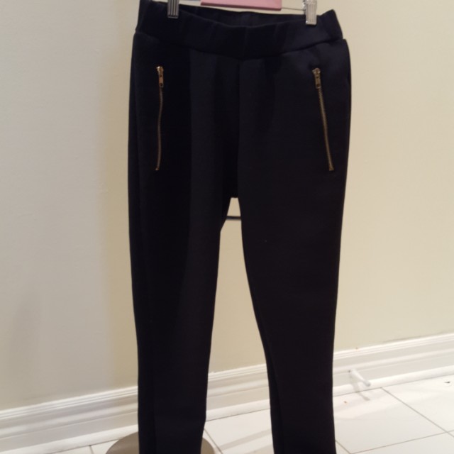 black leggings with gold zipper