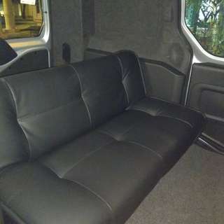 Black faux leather foldable sofa
